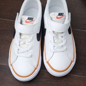 Nike Kids White Sneakers with Orange Trim